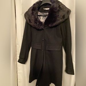 Ricki’s XS Long coat.